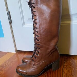 Knee high lace up boots. Brown